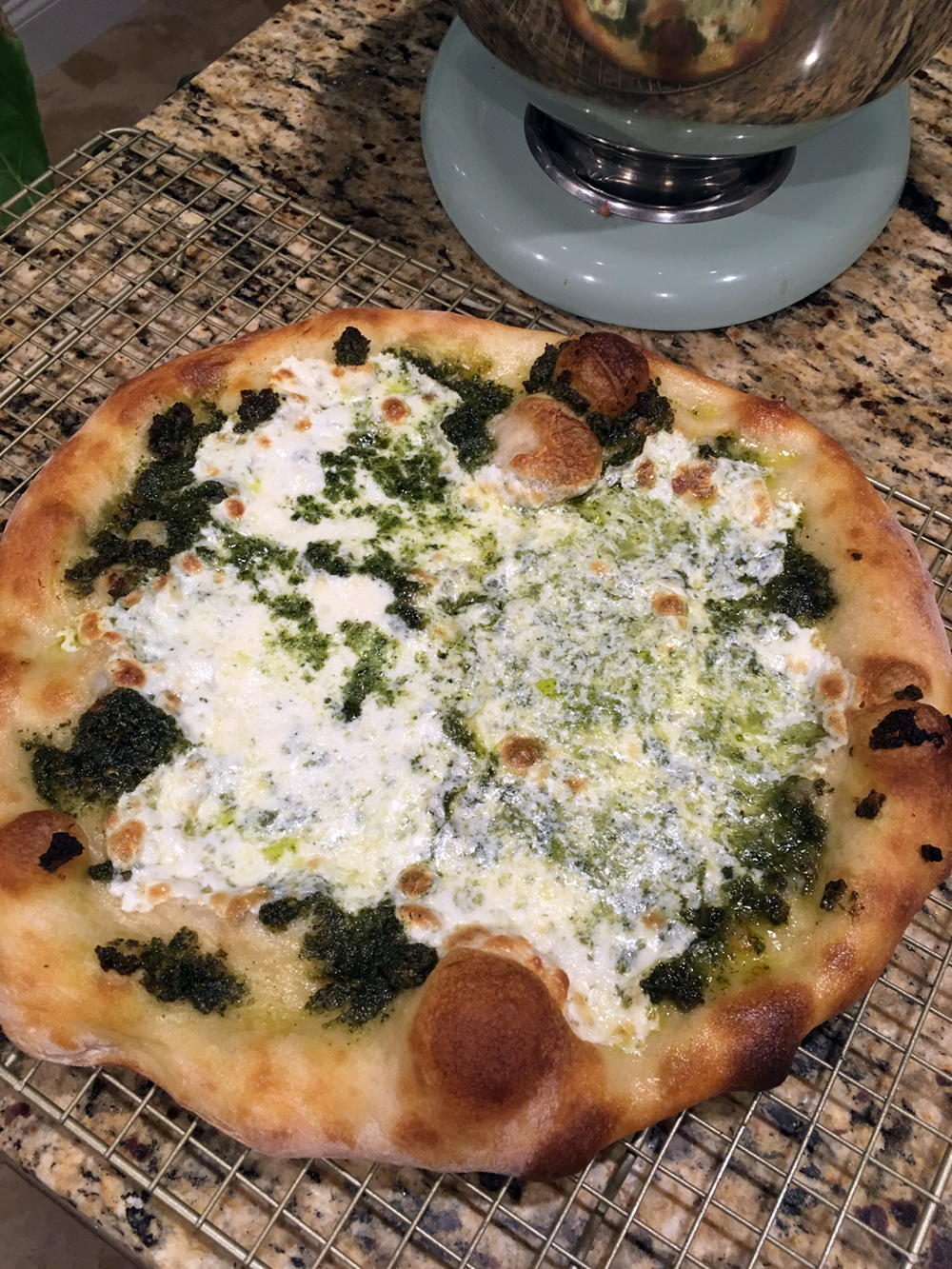 Carrot top and fennel pesto pizza