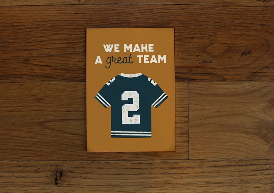 A greeting card featuring a jersey that says "we make a great team"